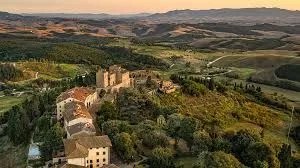 Aerial view of the village of Castelfalfi surrounded by the Tuscan countryside