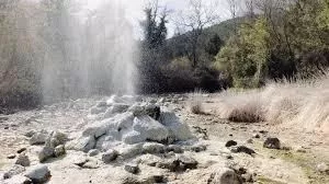 Bollori di Putizza hypothermal park with its geysers.