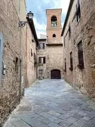 Medieval stone alley in the historic centre of Gambassi Terme, Tuscany
