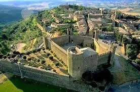 View of the historic village of Montepulciano overlooking the Tuscan hills