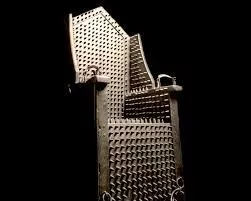 Museum of Torture in Volterra displaying historical instruments and medieval artifacts