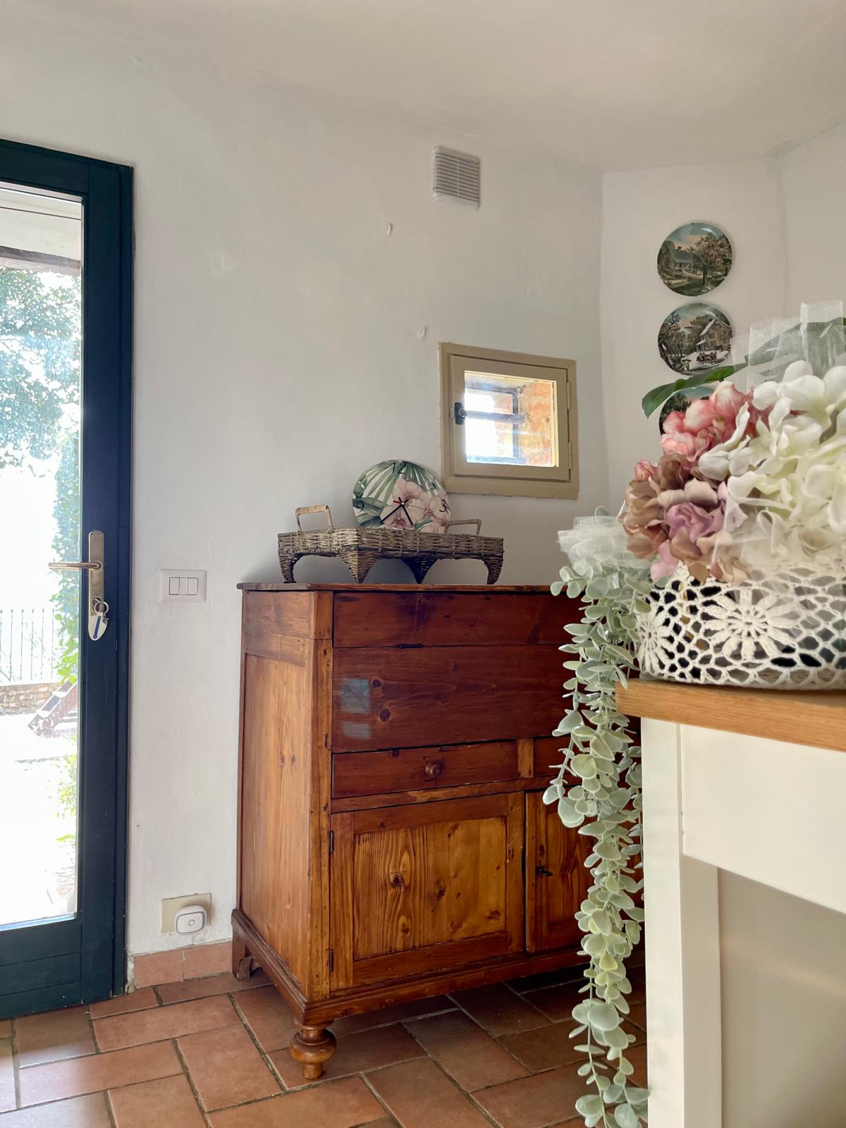 Bedroom with wardrobe at Podere Settefrati farmhouse