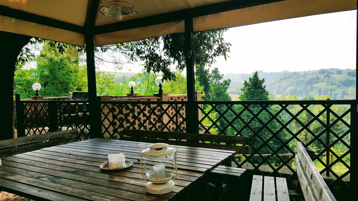 Porch view with table and chairs at Podere Settefrati