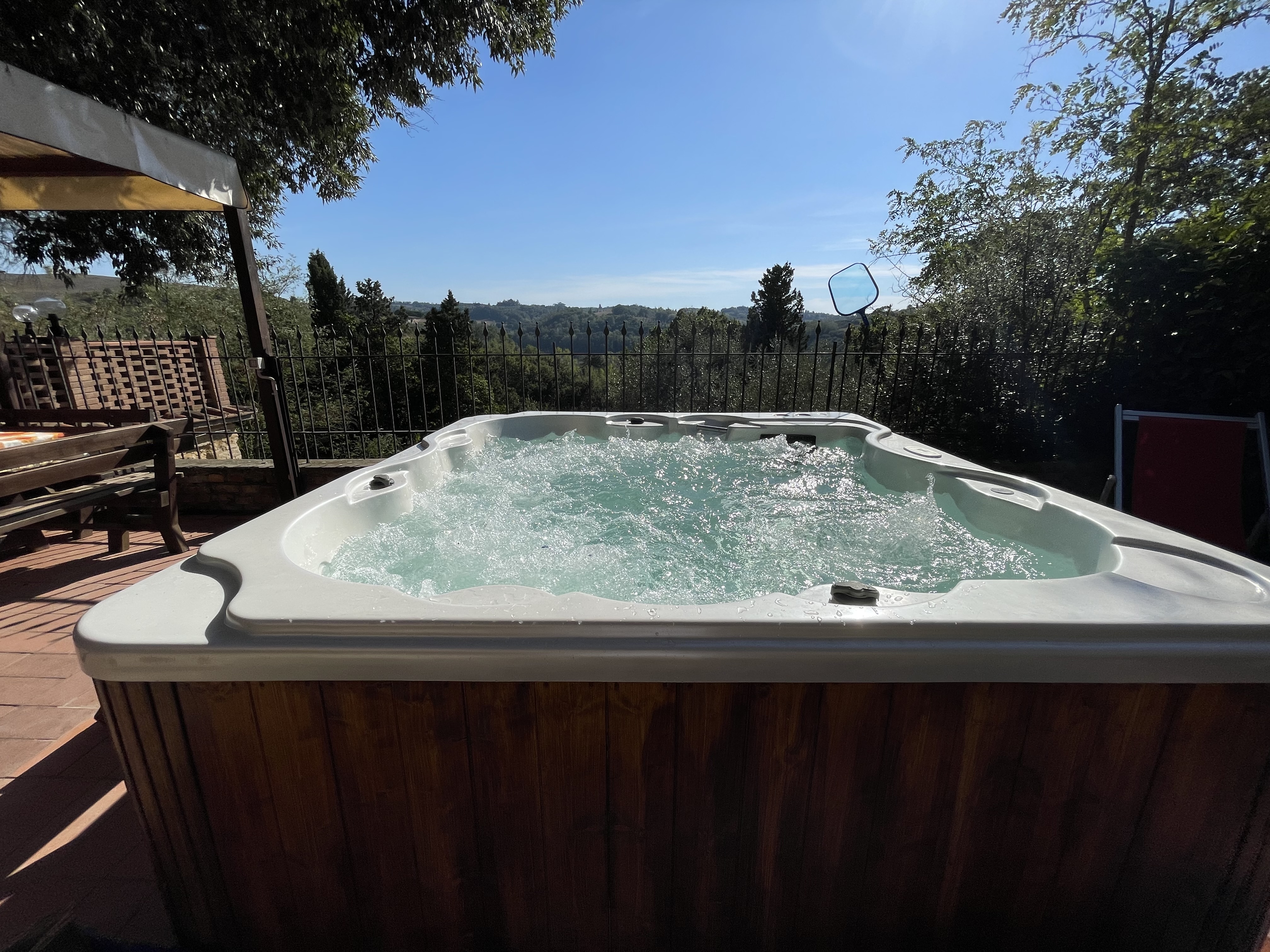 Relaxing hot tub surrounded by nature at Podere Settefrati Tuscany