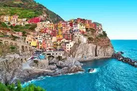 Riomaggiore village with colorful houses along the Ligurian coast in the Cinque Terre