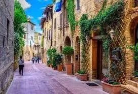 Medieval street with shops and restaurants in San Gimignano