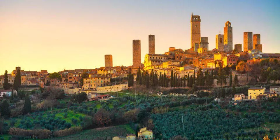 San Gimignano skyline at sunset overlooking the Tuscan countryside