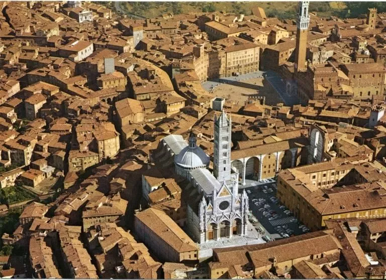 Panoramic view of Siena historic city in the Tuscan countryside